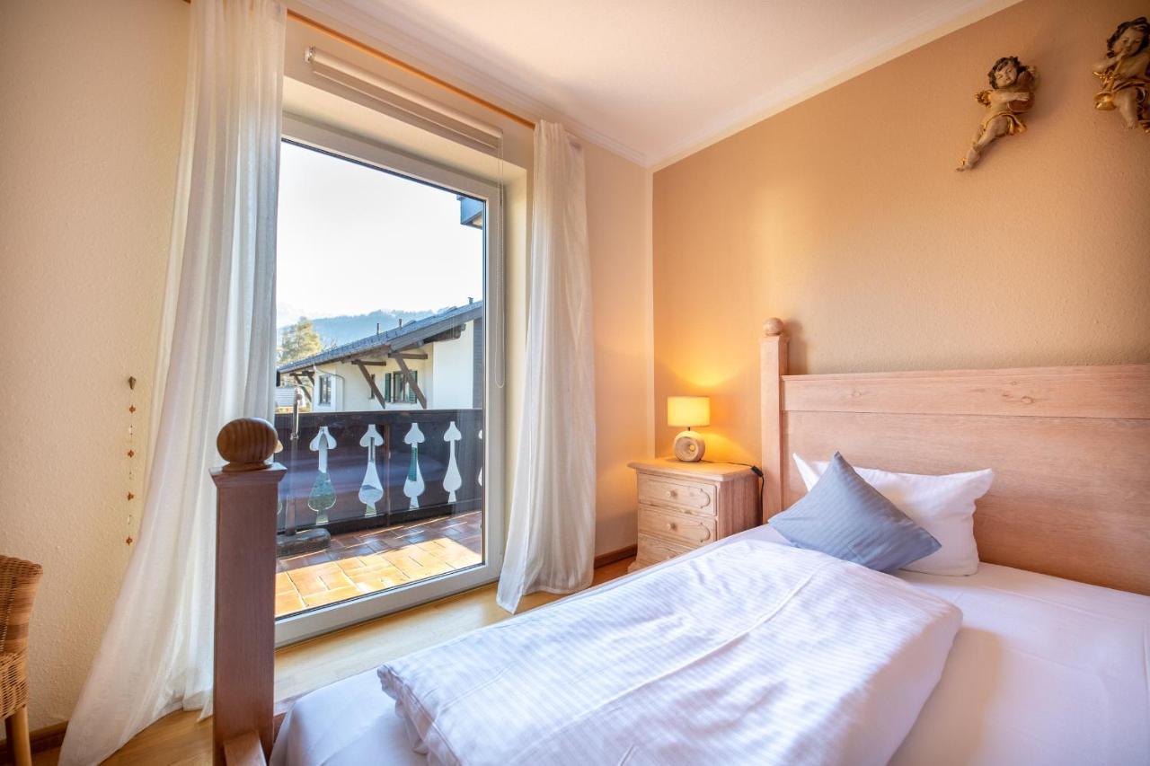 Aussicht Apartment การ์มิช-พาร์เทนเคียร์เชน ภายนอก รูปภาพ